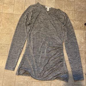 Gray draped long sleeve top looks great with a cami